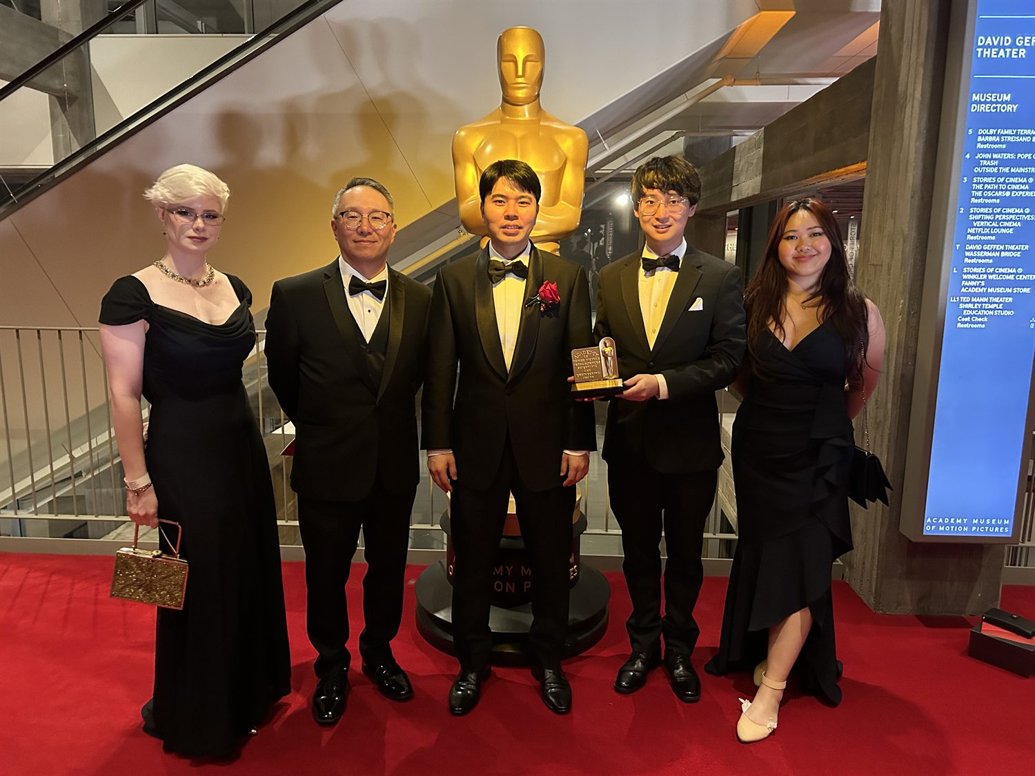 CLO team with the 2024 Academy Sci-Tech Award at the Academy Museum